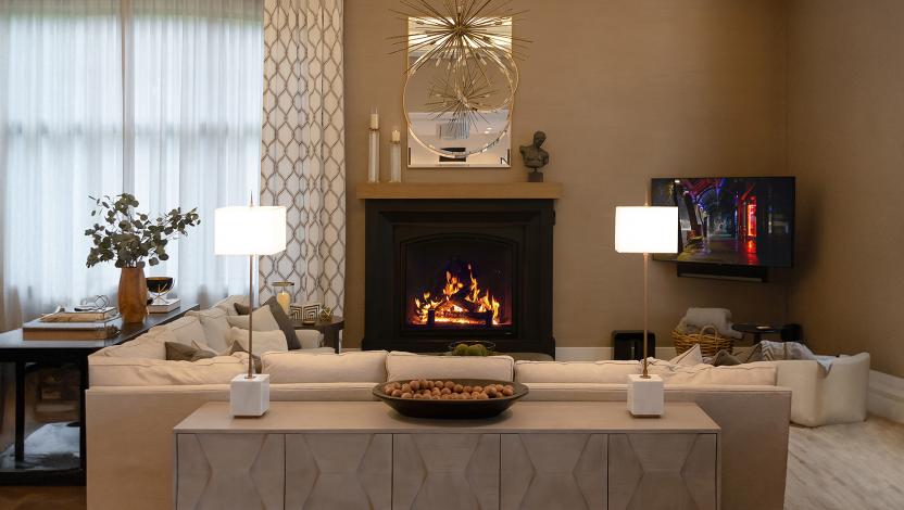 Modern living room featuring RadioRA 3 wireless control for dimmers switches and shades