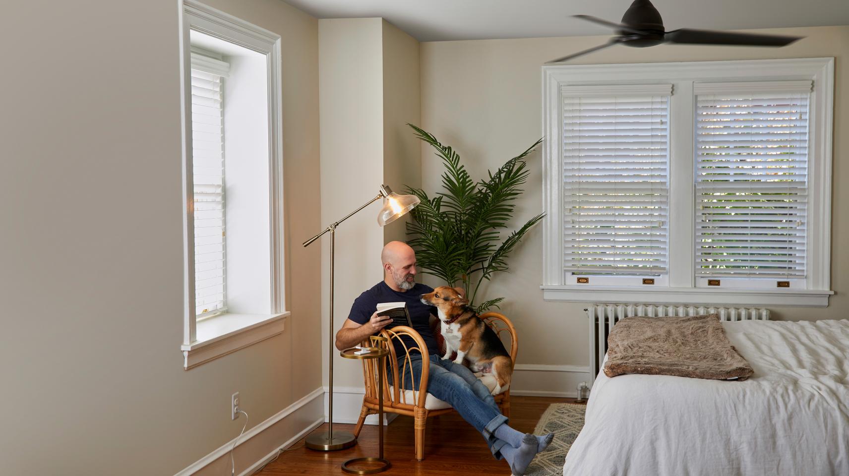 bedrm-shinyfall19-man-sitting-with-dog-extended