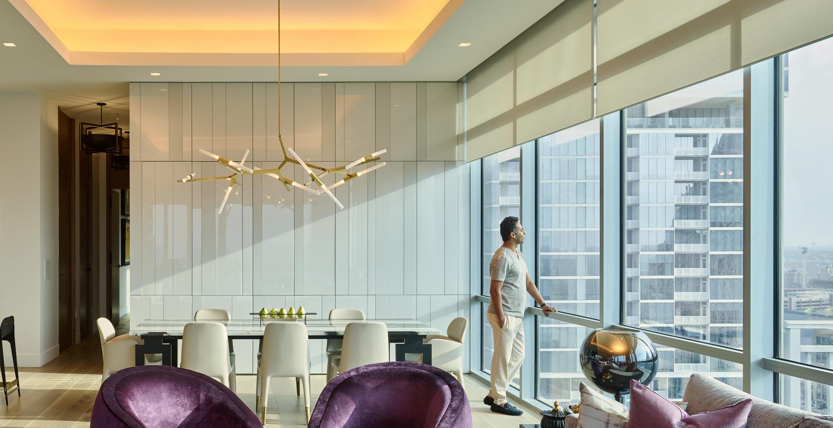 Lutron lighting in high-rise dining room harmonizing with natural light